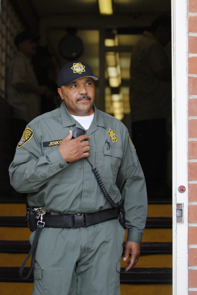 Ron Jenkins stands in a doorway at a corrections  and rehabilitation facilty.