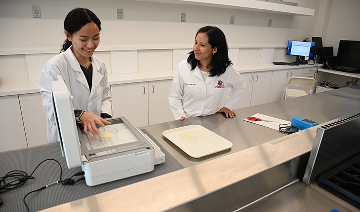 Growing up in the city of Surabaya in East Java, Indonesia, senior culinology student Kaylin Prayitno (left) started dreaming of attending Fresno State at the age of six when she saw Fresno State memorabilia around the house.