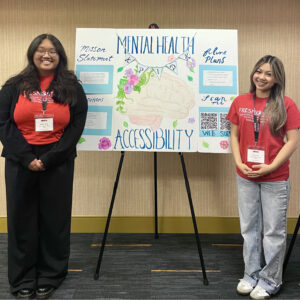 AANAPISI students Ginger Hang and Destiny Lor present their research project tied to creating a website to promote health and well-being resources for students. 