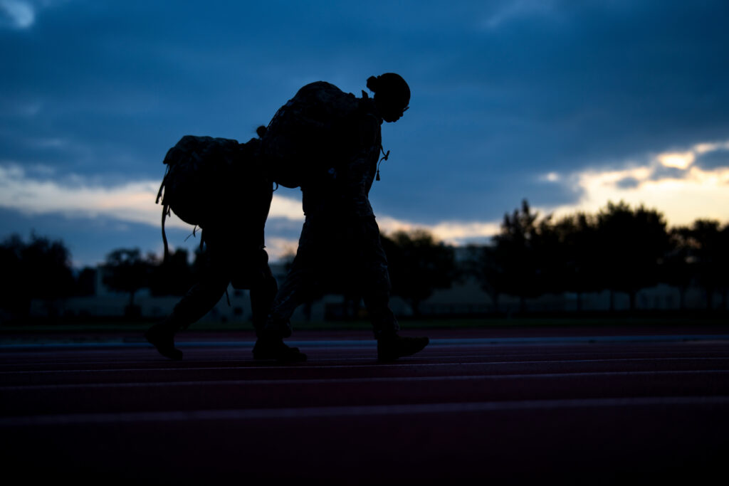 Shadow of Army ROTC cadet walking