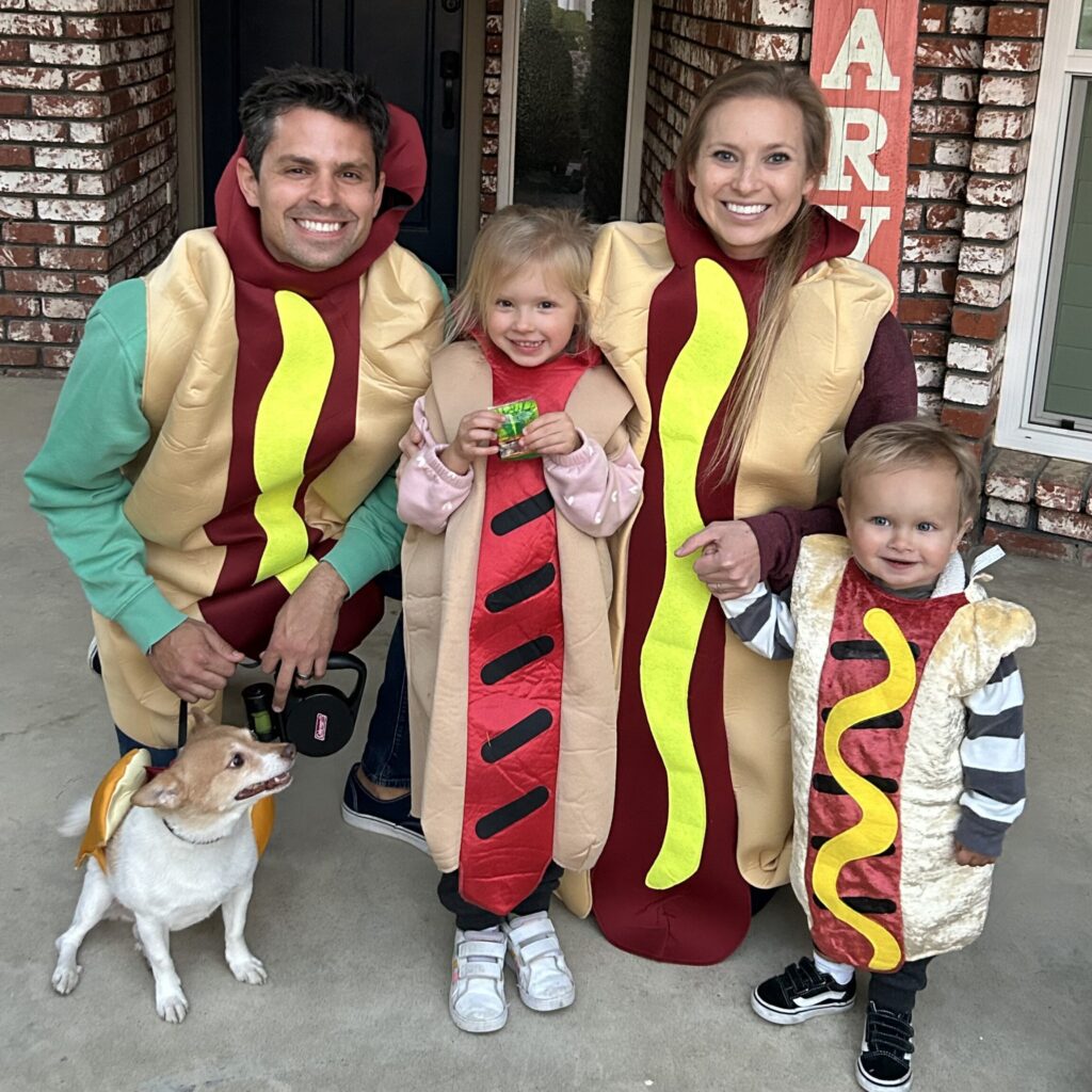 Dr. Ryann Christensen, husband, Lance, and their children Logan, 6, and Hayes, 3, dressed as hot dogs.