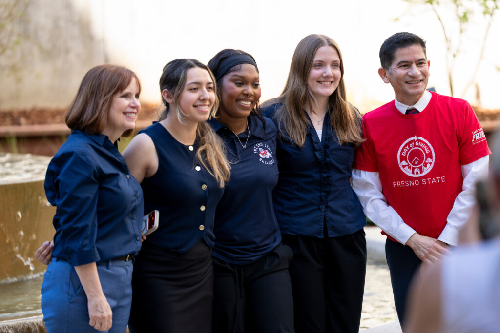 Dean Julie Olson-Buchanan, Kirsten Martinez, Kennedi Campbell-Caldwell, Faith Bither, and President Saúl Jiménez-Sandoval at Peters Fountain ribbon cutting ceremony.