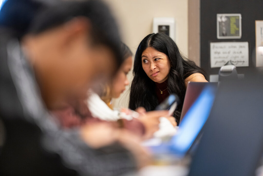 Chrizia Dela Rosa makes a funny face while interacting with a student.