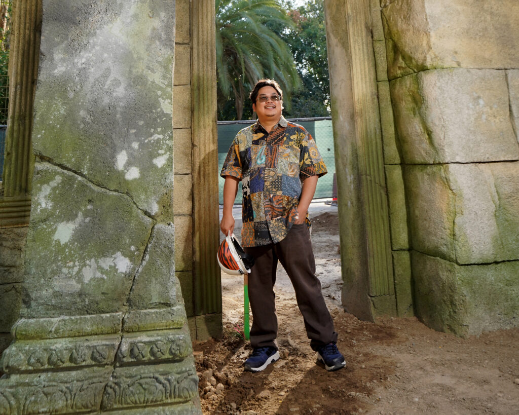 Dr. W. Saam Noonsuk, an art history professor at Fresno State, stands in the new Kingdoms of Asia exhibit at the Fresno Chafee Zoo.