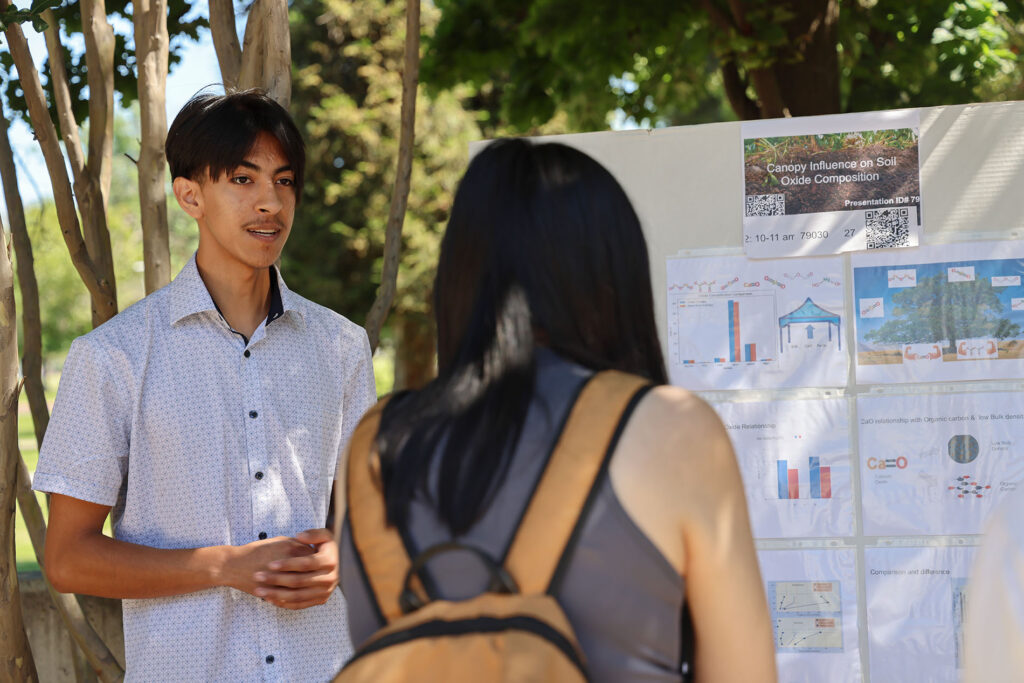 Student presents his project "Canopy Influence on Soil Oxide Composition" at the spring 2026 Showcase of Excellence, presented by the College of Science and Mathematics at Fresno State.